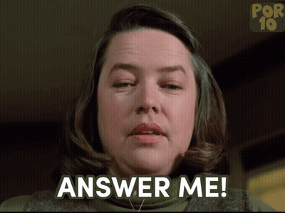 A Woman Says " Answer Me " In Front Of A Por 19 Logo GIF