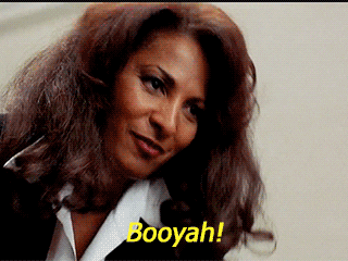 A Woman Says Booyah With A Yellow Border Around Her Face GIF