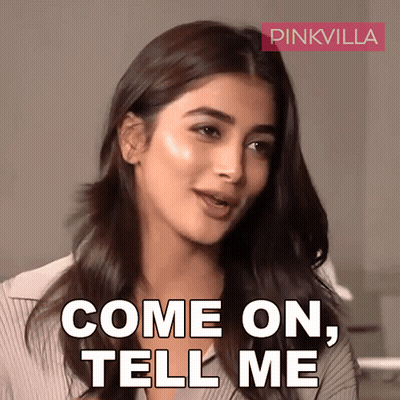 A Woman Says Come On Tell Me With A Pinkvilla Logo Behind Her GIF