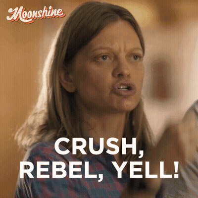 A Woman Says " Crush Rebel Yell " In Front Of A Moonlight Logo GIF