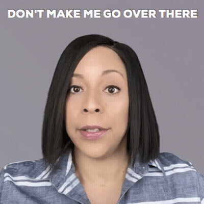 A Woman Says " Don T Make Me Go Over There " While Looking At The Camera GIF