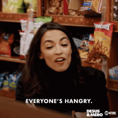 A Woman Says Everyone 'S Hangry In Front Of Chips GIF