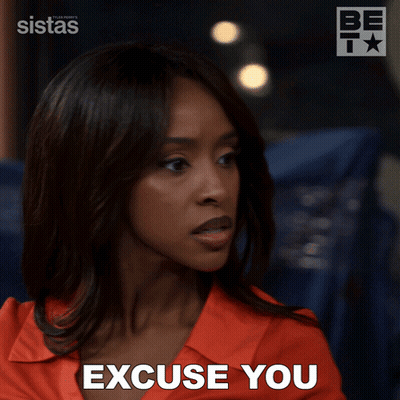 A Woman Says Excuse You In Front Of A Sistas Logo GIF