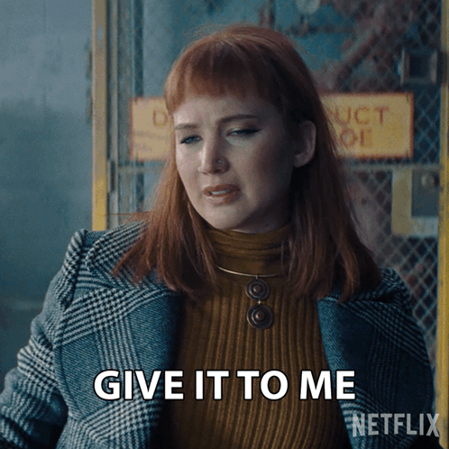 A Woman Says Give It To Me In A Netflix Ad GIF