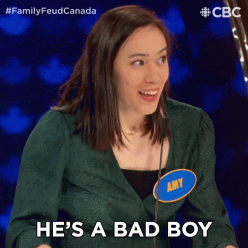 Woman Holding Microphone Saying Bad Boy GIF
