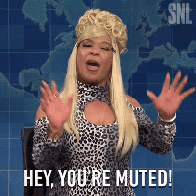 A Woman Says Hey You 'Re Muted In Front Of A Map GIF