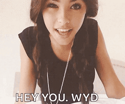 A Woman Says Hey You Wyd In Front Of A White Background GIF
