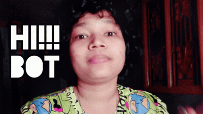 A Woman Says Hi Bot In Front Of A Dark Background GIF