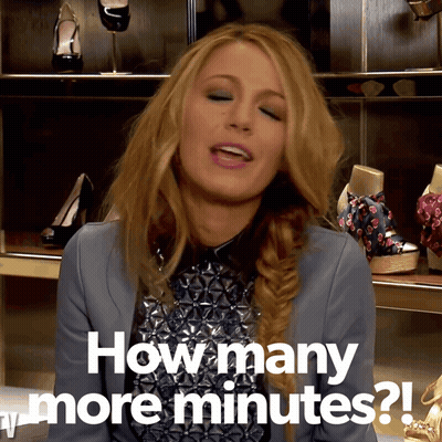A Woman Says How Many More Minutes In Front Of A Shoe Rack GIF