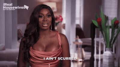A Woman Says I Ain 'T Scurred In A Real Housewives Ad GIF