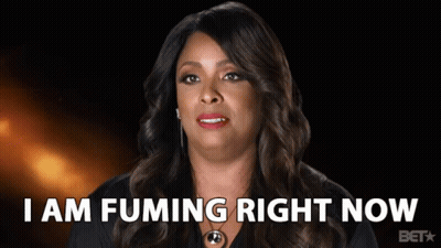 A Woman Says I Am Fuming Right Now In Front Of A Black Background GIF