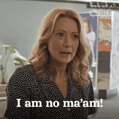 A Woman Says " I Am No Ma 'Am " In Front Of A Son Of A Chick Poster GIF