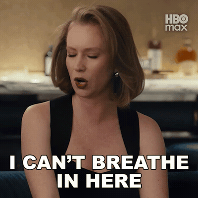A Woman Says " I Can 'T Breathe In Here " In Front Of A Hbo Max Logo GIF