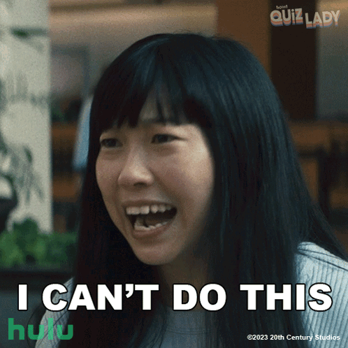 A Woman Says " I Can 'T Do This " In Front Of A Poster For Quiz Lady GIF