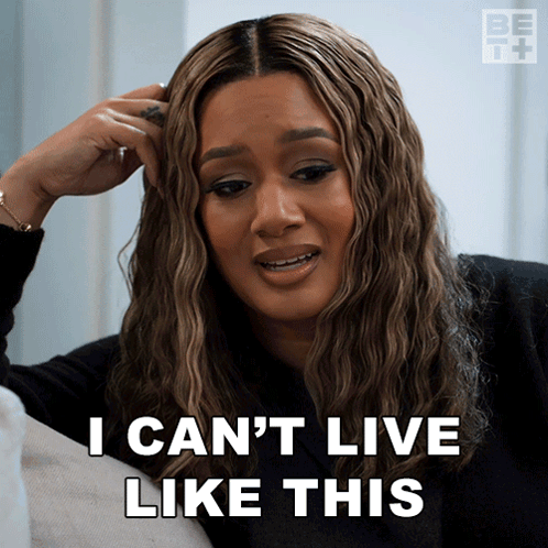 A Woman Says I Can 'T Live Like This While Sitting On A Couch GIF