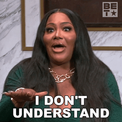 A Woman Says I Do N't Understand While Holding Her Hand Out GIF