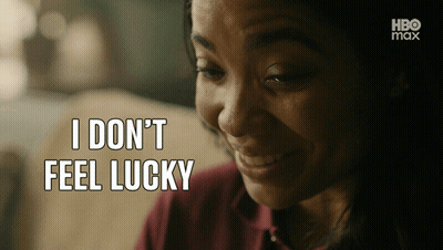 A Woman Says " I Don 'T Feel Lucky " In Front Of A Hbo Max Logo GIF