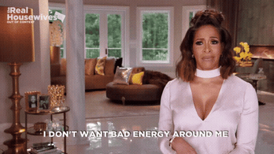 A Woman Says I Don T Want Bad Energy Around Me In Front Of A Living Room GIF