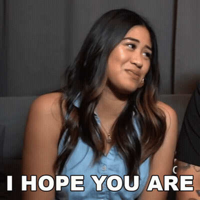 A Woman Says I Hope You Are While Looking At The Camera GIF
