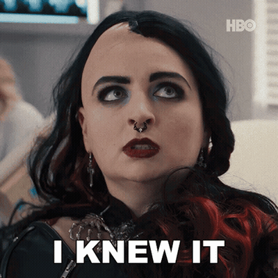 A Woman Says I Knew It In Front Of A Hbo Sign GIF