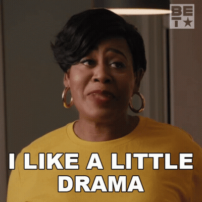 A Woman Says I Like A Little Drama In A Yellow Shirt GIF