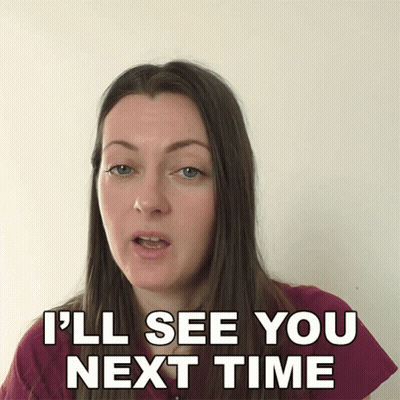 A Woman Says " I 'Ll See You Next Time " In Front Of A White Wall GIF