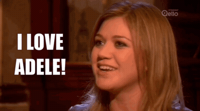 A Woman Says " I Love Adele " While Smiling And Looking Up GIF