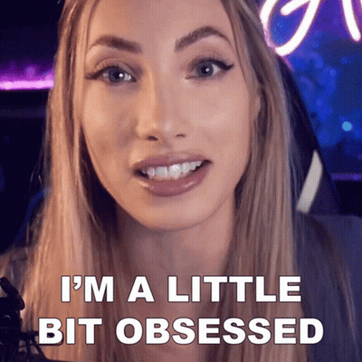 A Woman Says " I 'M A Little Bit Obsessed " While Smiling GIF