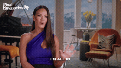 A Woman Says I 'M All In In Front Of A Real Housewives Logo GIF