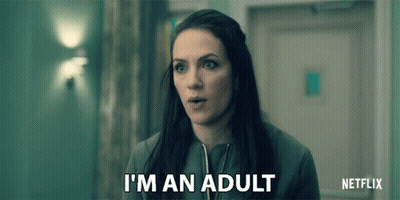 A Woman Says I 'M An Adult In Front Of A Netflix Logo GIF