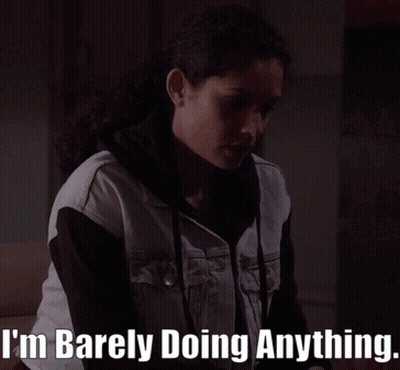 A Woman Says I 'M Barely Doing Anything In A Dark Room GIF