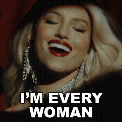 A Woman Says I 'M Every Woman In Front Of A Red Background GIF