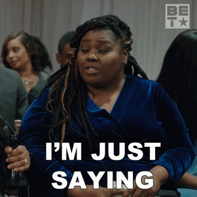 A Woman Says I 'M Just Saying In A Blue Dress GIF