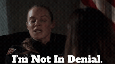 A Woman Says " I 'M Not In Denial " In Front Of Another Woman GIF