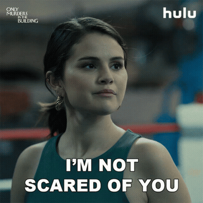 A Woman Says " I 'M Not Scared Of You " In A Boxing Ring GIF
