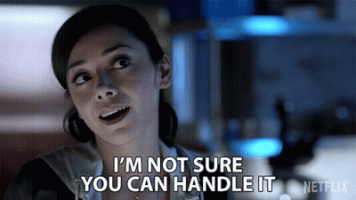 A Woman Says " I 'M Not Sure You Can Handle It " In A Netflix Ad GIF