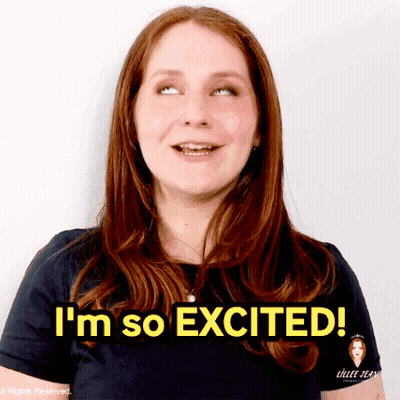 A Woman Says I 'M So Excited In Front Of A White Background GIF