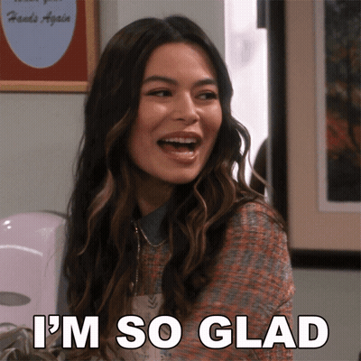A Woman Says I 'M So Glad In Front Of A Picture Of Friends Again GIF