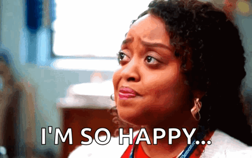 A Woman Says I 'M So Happy While Wearing A Lanyard GIF