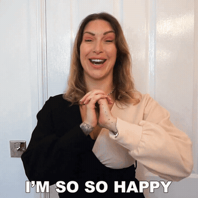 A Woman Says I 'M So So Happy While Smiling GIF