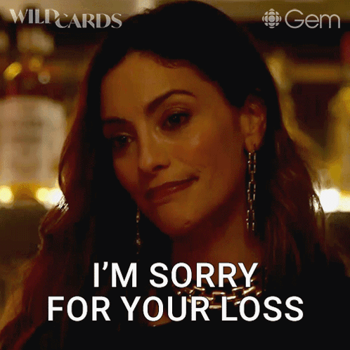 A Woman Says I 'M Sorry For Your Loss While Wearing Earrings GIF
