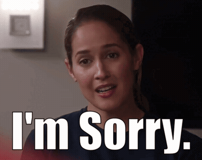 A Woman Says I 'M Sorry In Front Of A Picture Of Her GIF