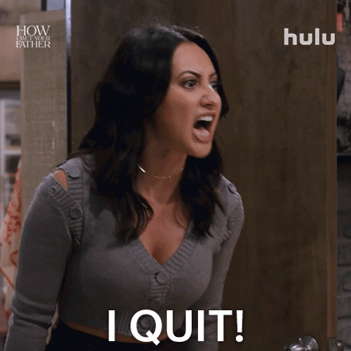 A Woman Says I Quit In Front Of A Sign That Says Hulu GIF