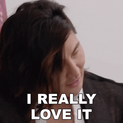 A Woman Says " I Really Love It " While Looking Down GIF