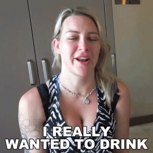 A Woman Says I Really Wanted To Drink In Front Of A Closet GIF
