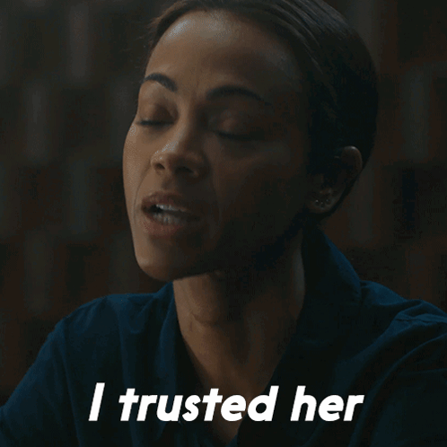 A Woman Says " I Trusted Her " In White Letters GIF