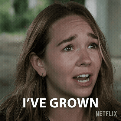 A Woman Says I 'Ve Grown With A Netflix Logo Behind Her GIF