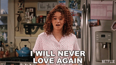 A Woman Says I Will Never Love Again In Front Of A Fridge GIF