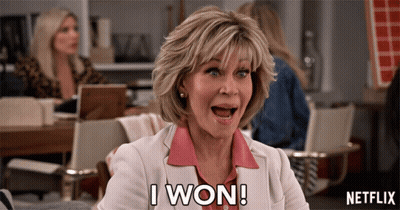 A Woman Says " I Won " In A Netflix Ad GIF