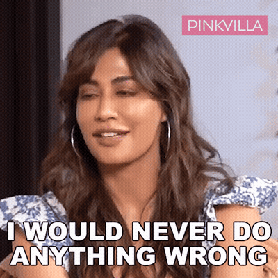 A Woman Says " I Would Never Do Anything Wrong " While Wearing Hoop Earrings GIF